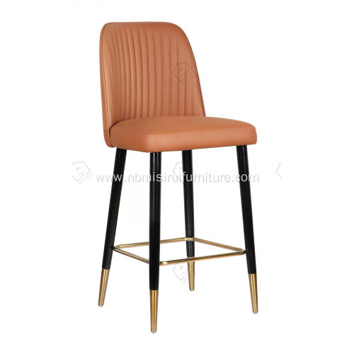 Orange faux leather bar stool